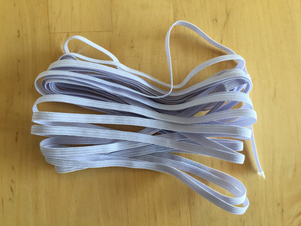 Flachgummi, ca. 5 mm breit, weiß, textilumflochten, 5 mtr.